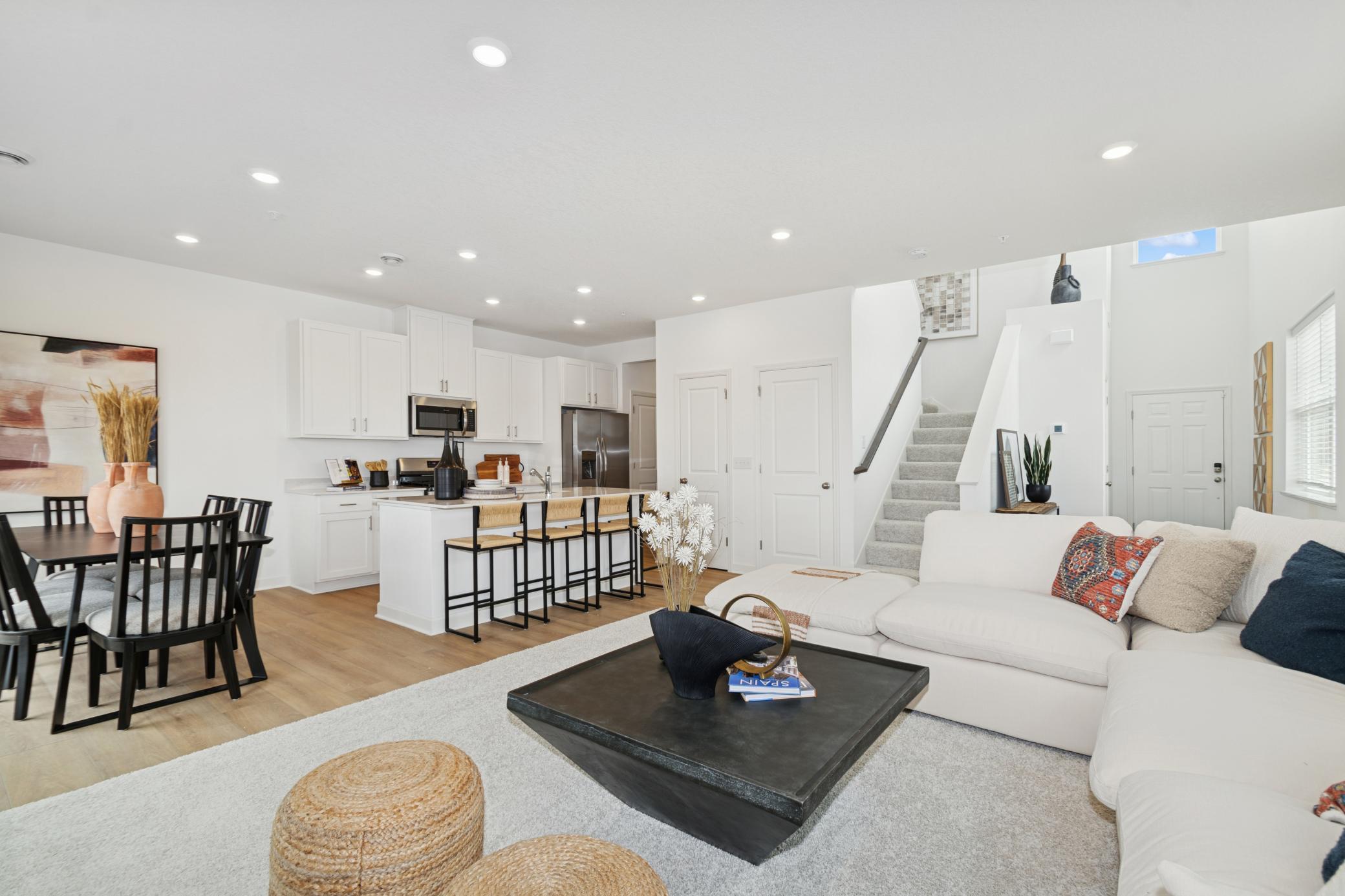 (Photo of model home, features will vary) This Great Room is framed by windows to bathe the space in natural light