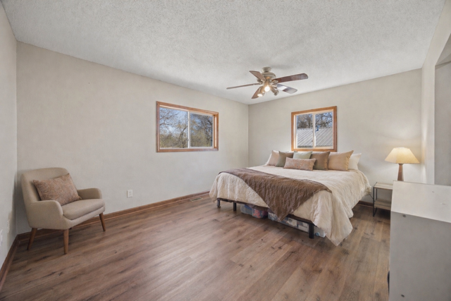 Primary bedroom suite offers fresh neutral paint, dual windows for extra lighting, LVP flooring, there is also a large walk thru closet and attached full bath! Imagine waking up HERE every morning!