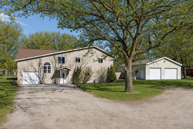 This beautiful 4 bed/3 bath home offers a functional layout for spacious living, privacy, and a large 30x40 detached garage with heat, concrete and electric! This has something for everyone! ** photo digitally enhanced