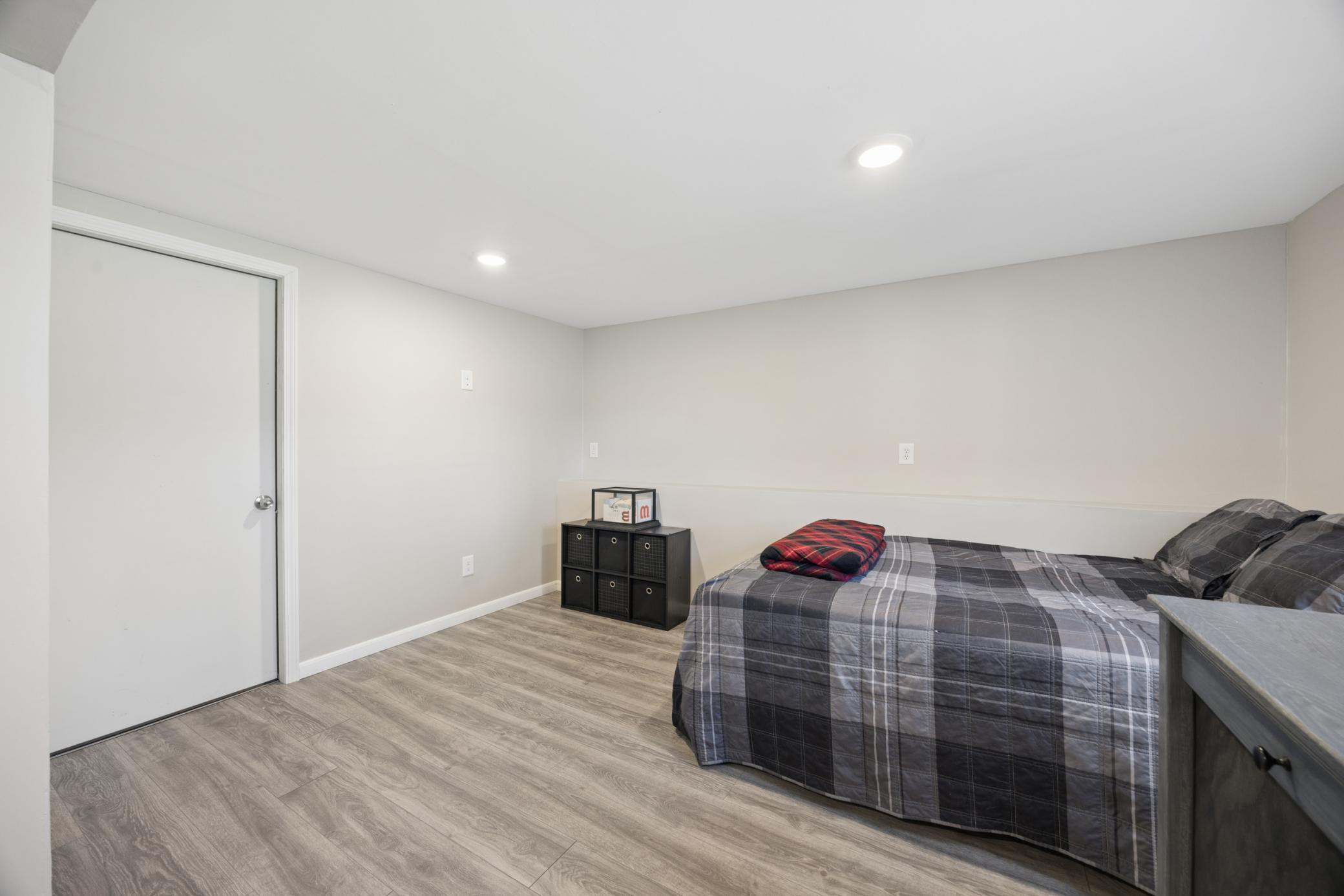 Bedroom 4 offers laminate floors, recessed lighting, fresh paint, and also has a separate access to the exterior! Perfect for an older teen or young adult who wants a little more space and privacy