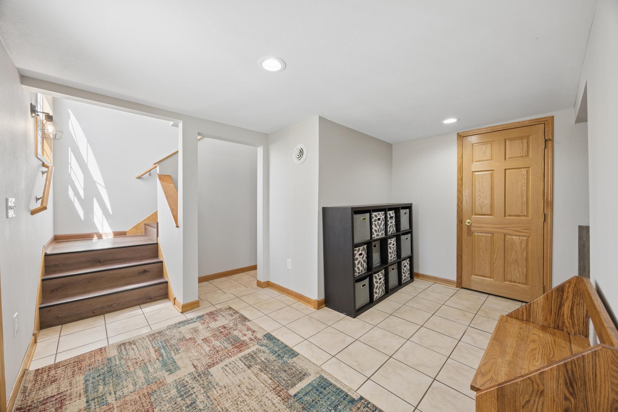 Another view of the foyer area... a perfect space for those "Minnesota long goodbyes!" Very bright and open too!