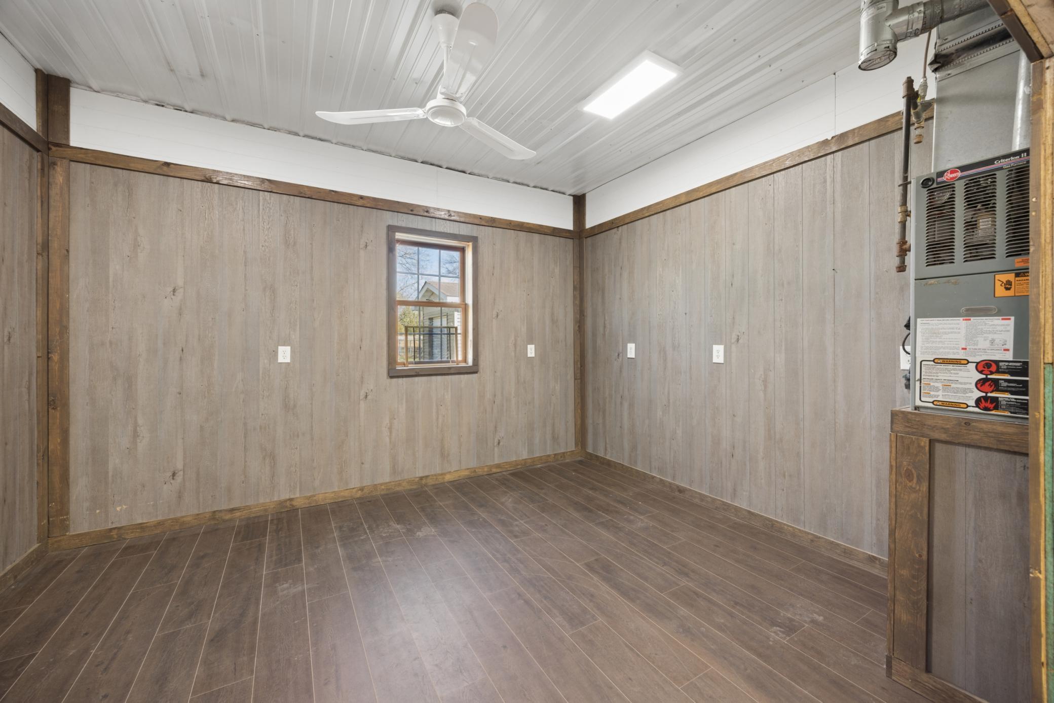 The back portion has been finished off and would make an excellent office space !!