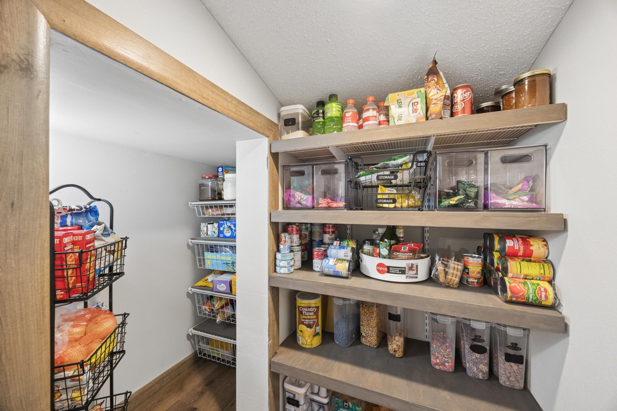 Yep!! There is a pantry too!! This large walk-in pantry offers enhanced storage space for those larger appliances and all the fun snacks!