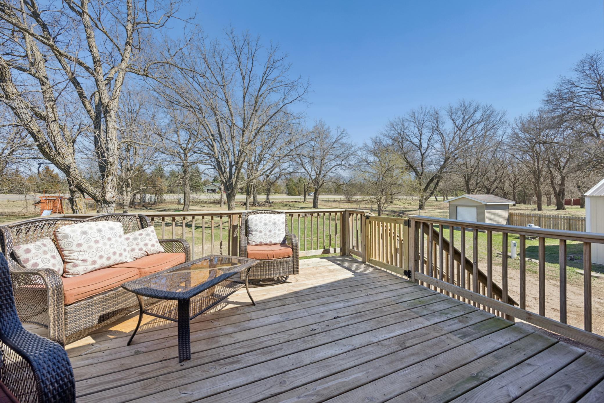 Awesome deck overlooking backyard and mature trees! Morning coffee here never tasted so good!