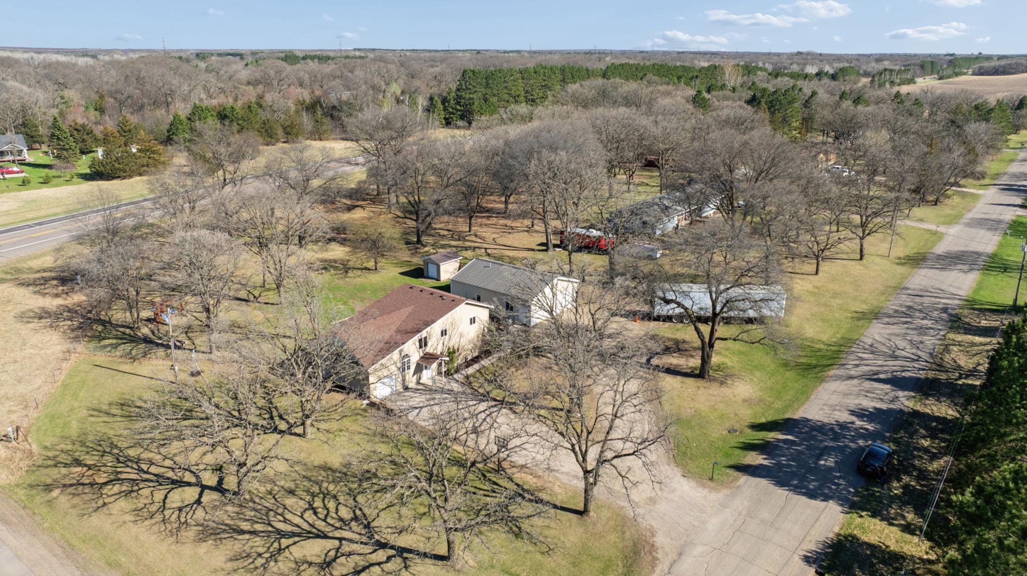 Ariel view of the lot and space. Large corner lot with fenced yard and plenty of room to roam here!