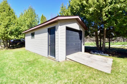 5123 Green Meadow Road SE Osakis, MN 56360 In addition to the 3-car garage is this storage shed, it includes a work bench and could be insulated for year-round use.