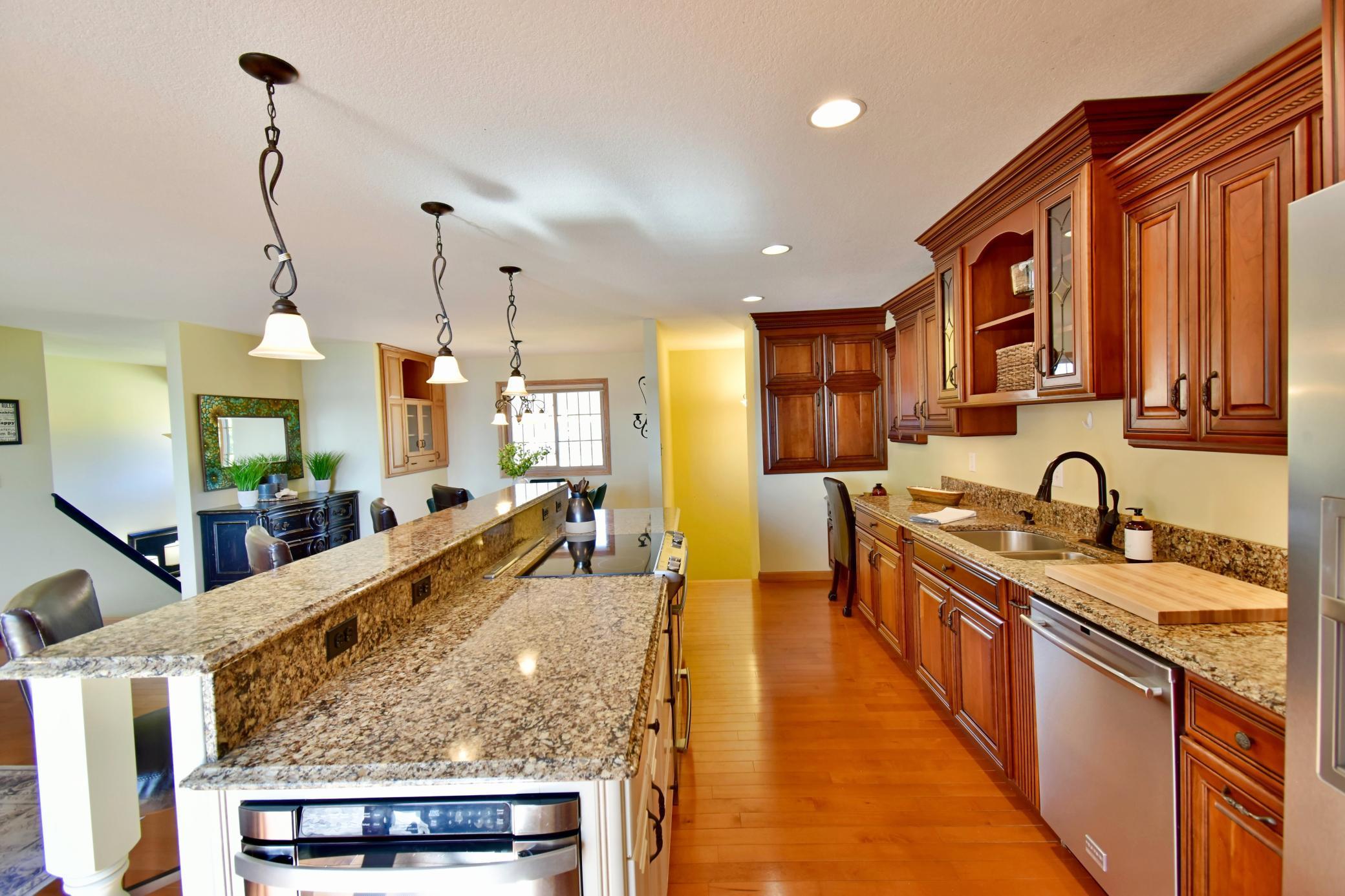 5123 Green Meadow Road SE Osakis, MN 56360 Stainless appliances including a microwave drawer, hallway leads to the back hall and garage for easy access.