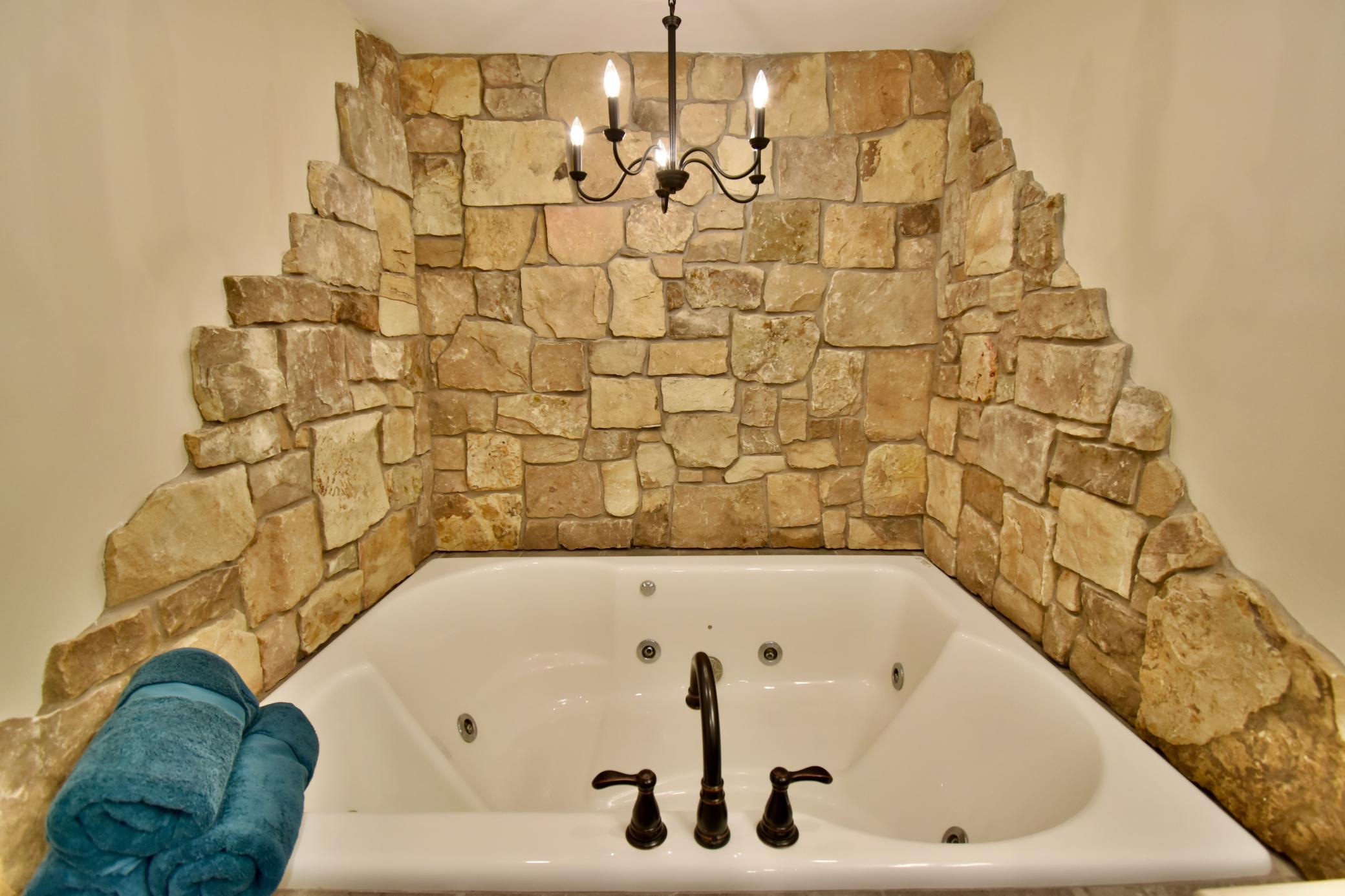5123 Green Meadow Road SE Osakis, MN 56360 Exquisite bath- whirlpool bath, custom cabinetry, tiled walk-in shower. This is a retreat in its own!