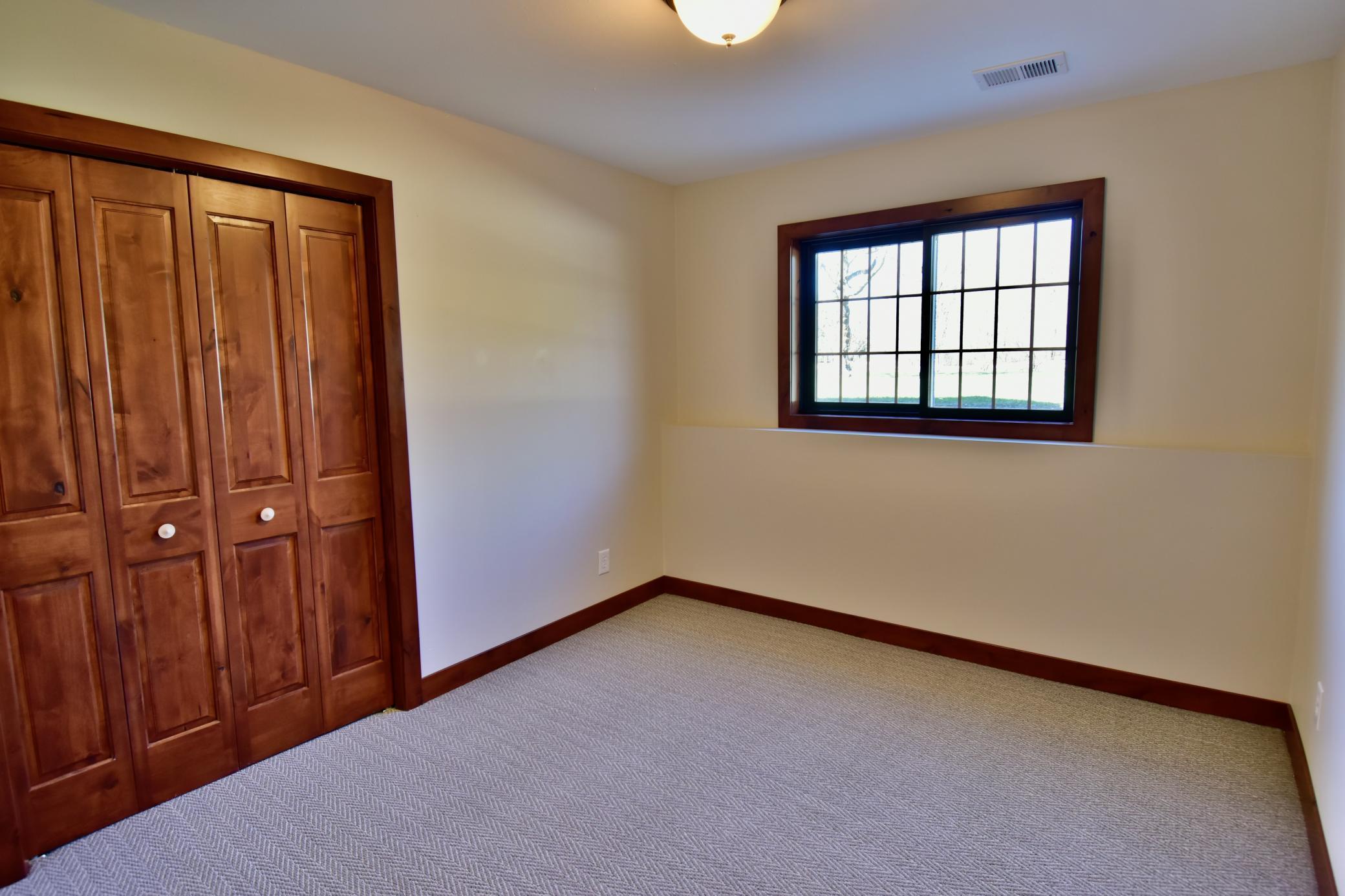 5123 Green Meadow Road SE Osakis, MN 56360 Lower-level bedroom #5 - room for all!