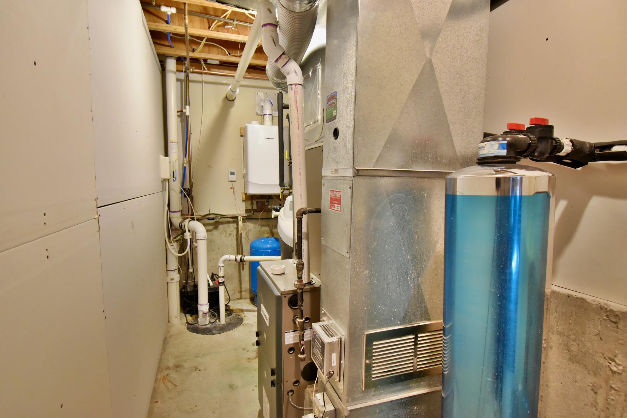 5123 Green Meadow Road SE Osakis, MN 56360 Utility room - The seller has installed several upgraded units for the water systems, tankless water heaters, and radon mitigation.