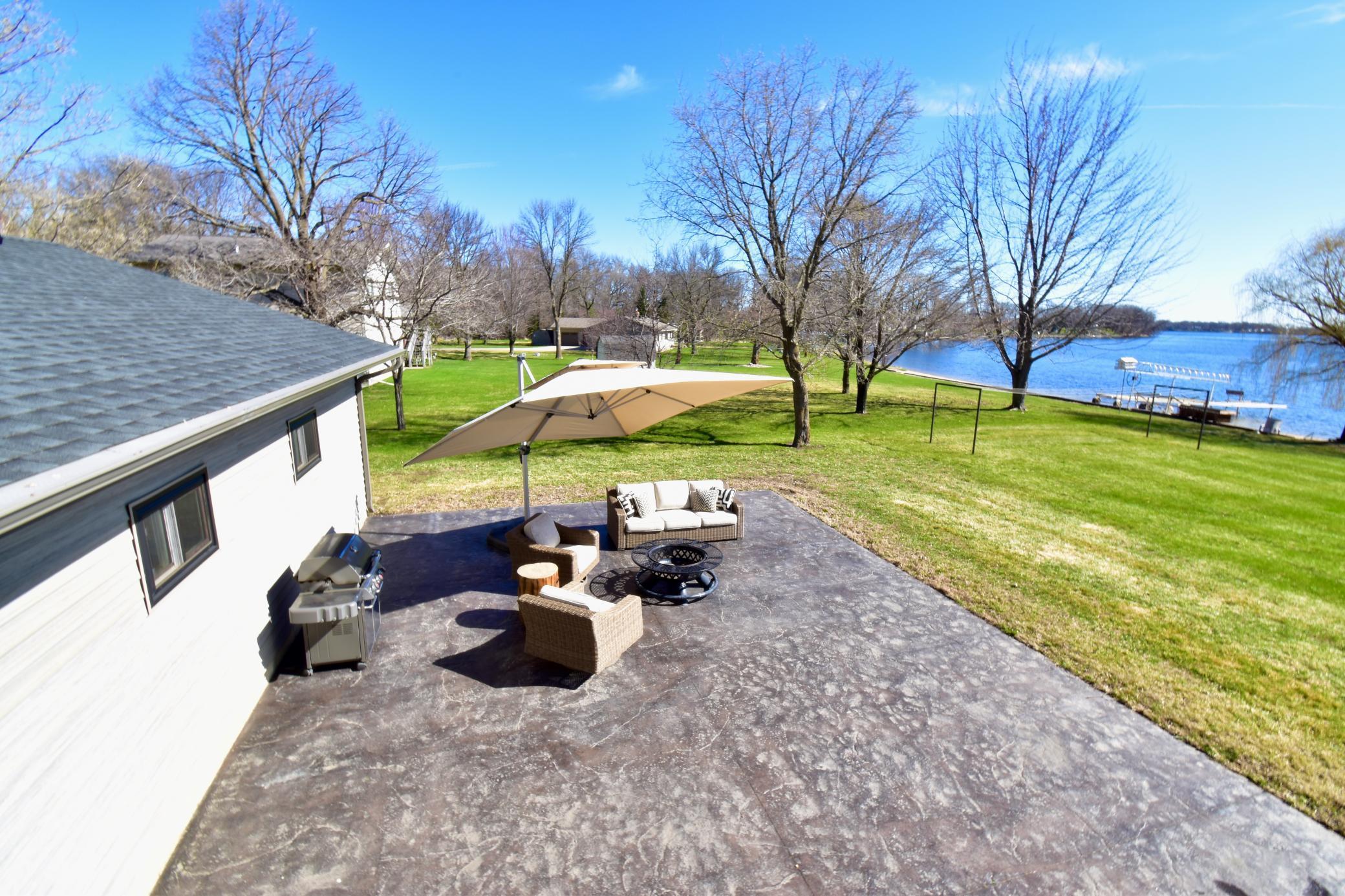 5123 Green Meadow Road SE Osakis, MN 56360 Stamped concrete patio. The seller had footings put in around the patio for a future screen porch.