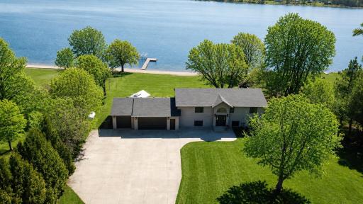 5123 Green Meadow Road SE Osakis, MN 56360 Welcome to the neighborhood! Beautiful 1 acre lot on Smith Lake, 5 bedrooms, 2 bathrooms, 3 car garage. Next to new condition. The sellers have paid attention to the details here!