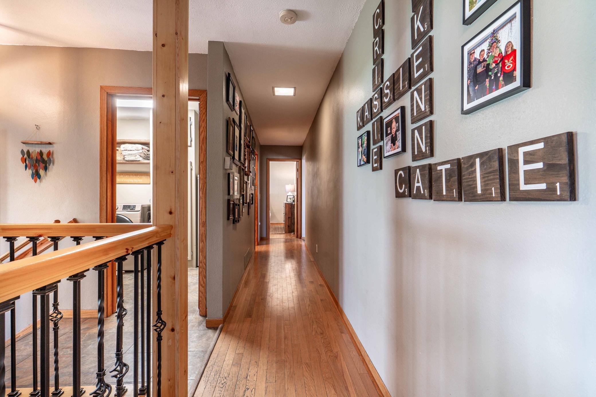 Hallway to BR/Bath/Laundry/Sunroom & Stairwell