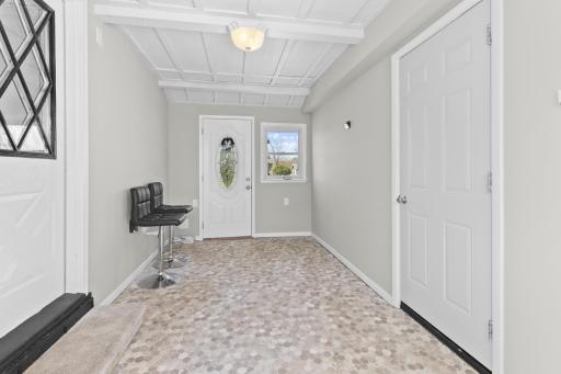 Another angle of the spacious breezeway, highlighting its practical layout and versatility.