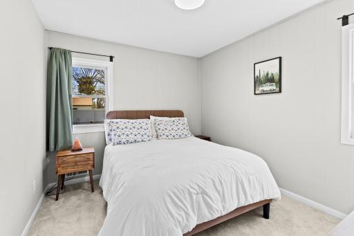 A spacious and inviting primary room that gets plenty of natural light and offers a wonderful space to unwind.