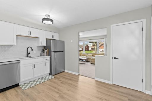 Looking out from the kitchen into the bright, open living area, beautifully showcasing the home's seamless and inviting layout.