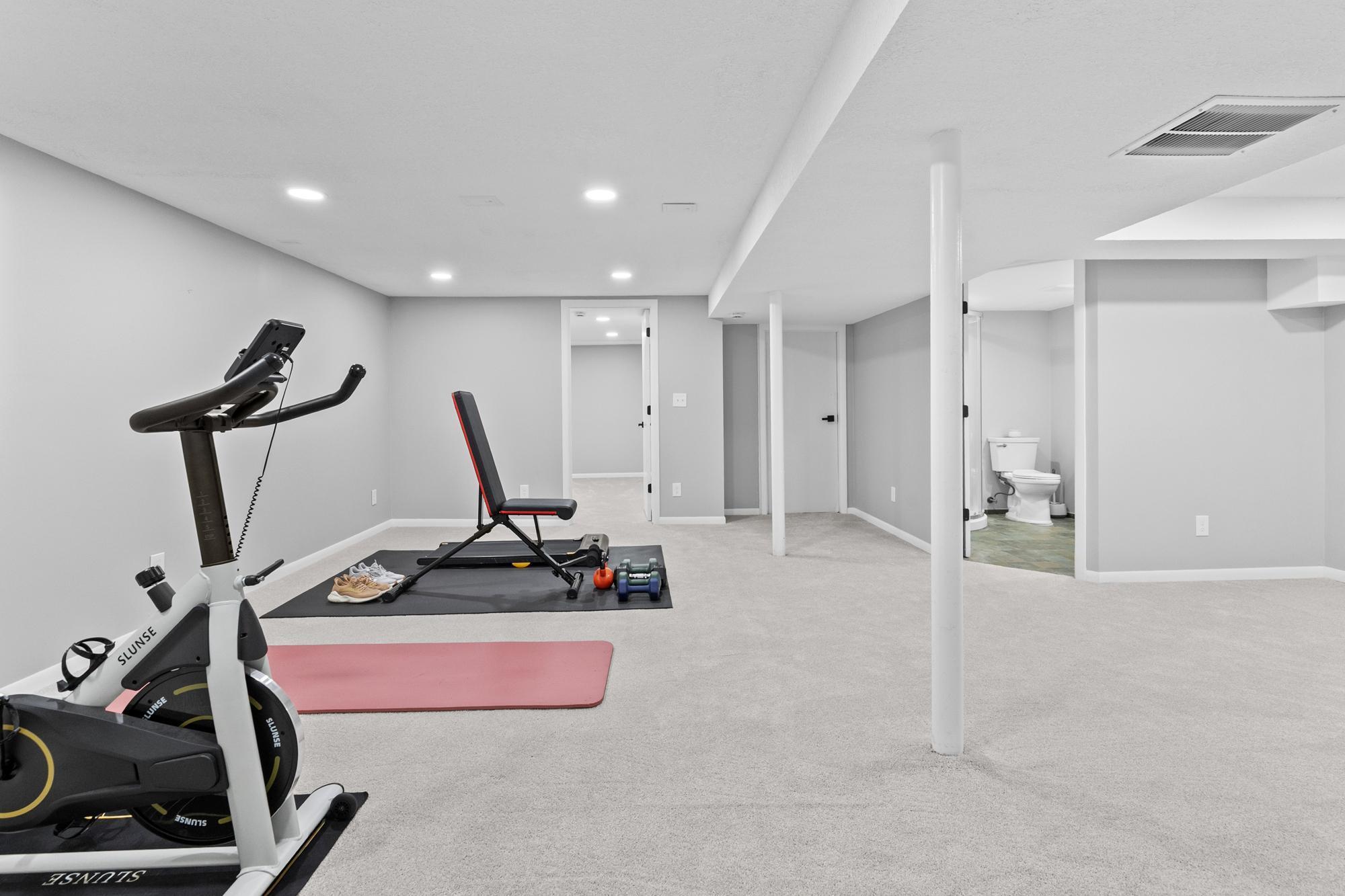 There is no shortage of usable square footage down here. This flexible space can easily host a large sectional for the ultimate movie room.