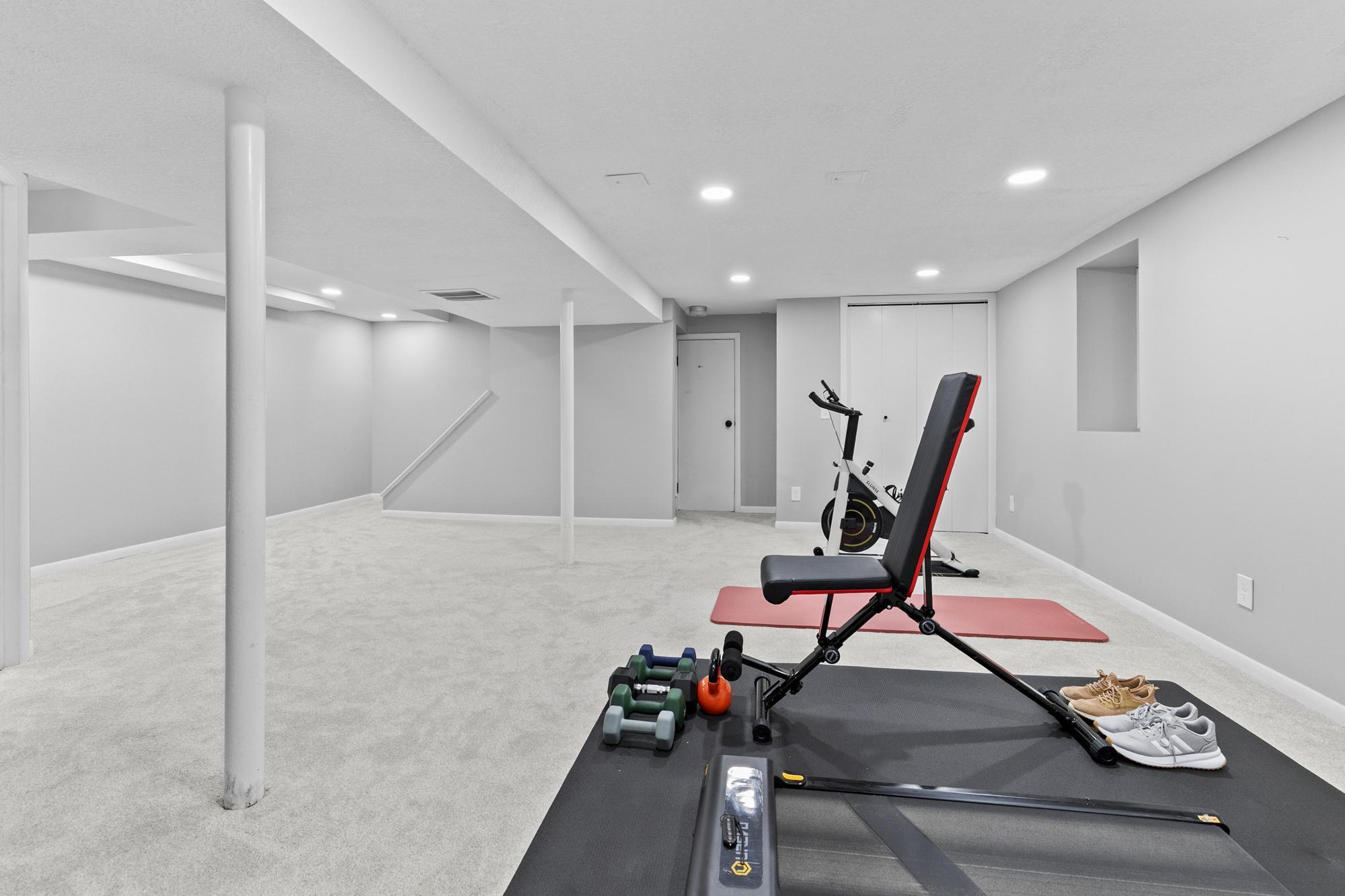 The open concept continues throughout the lower level, ensuring you have plenty of room to spread out and relax.