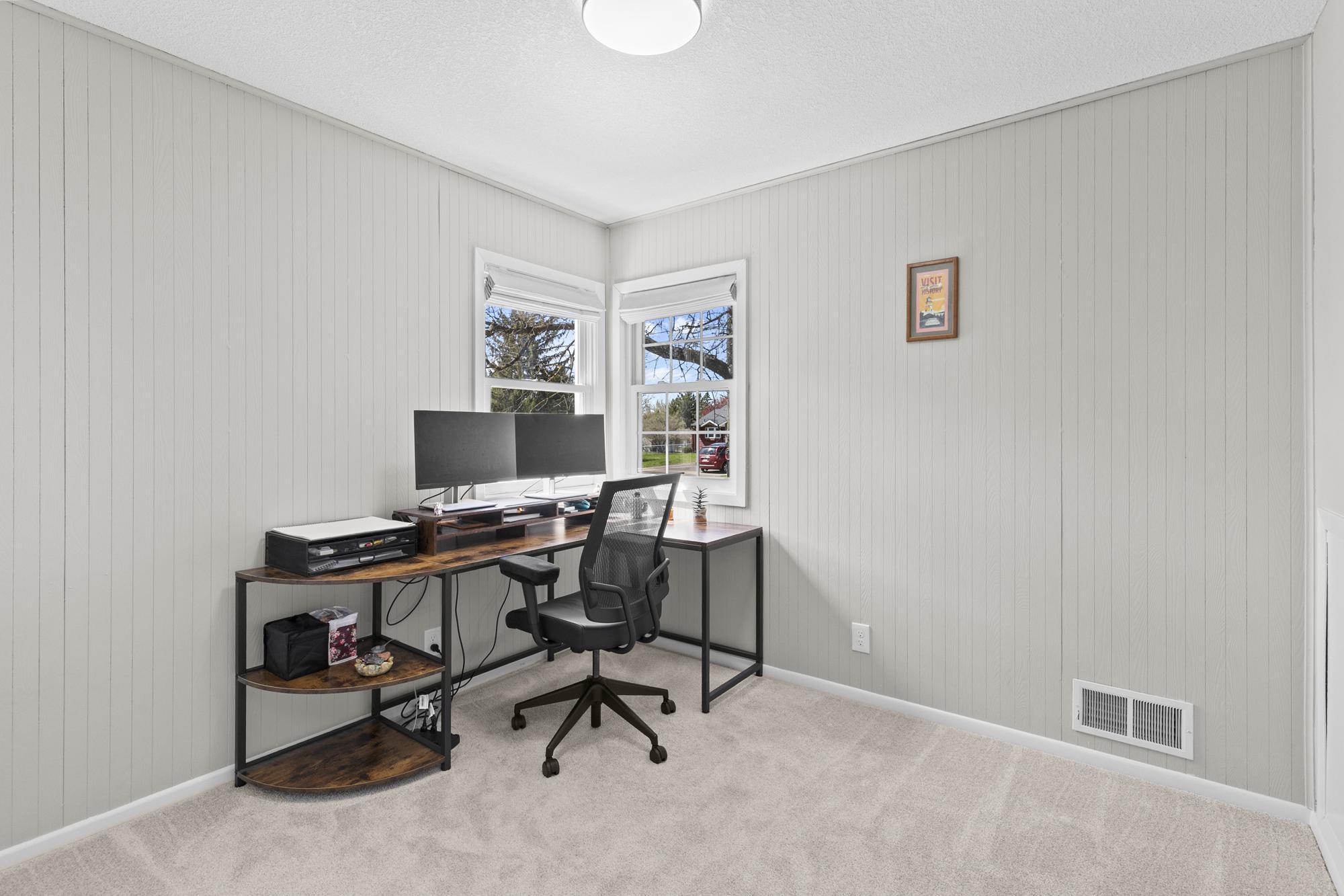 Another bright and spacious bedroom that easily doubles as a second office, hobby room, bedroom or guest space.