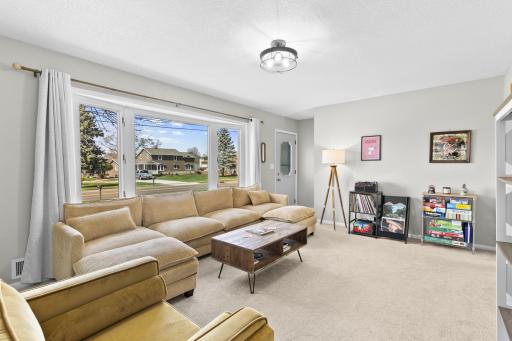 This versatile living room offers plenty of space for all your furniture and decor.