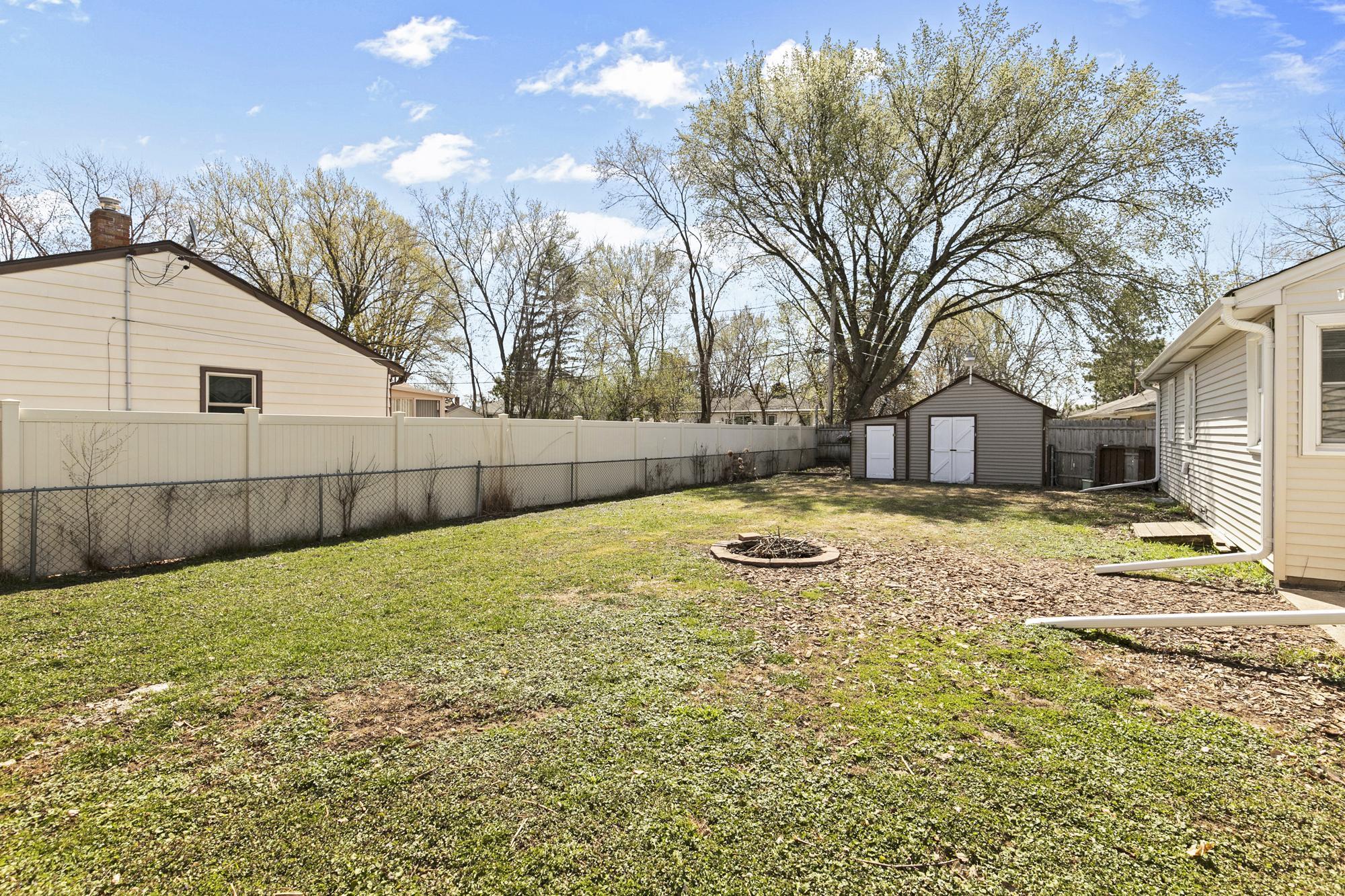 Entertain guests or relax on crisp evenings around the outdoor fireplace.