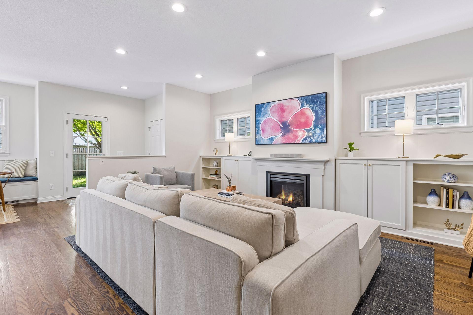Open main living area, with high ceilings and wood floors throughout.