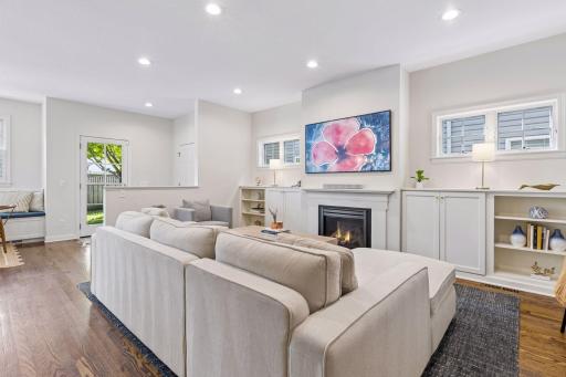 Open main living area, with high ceilings and wood floors throughout.