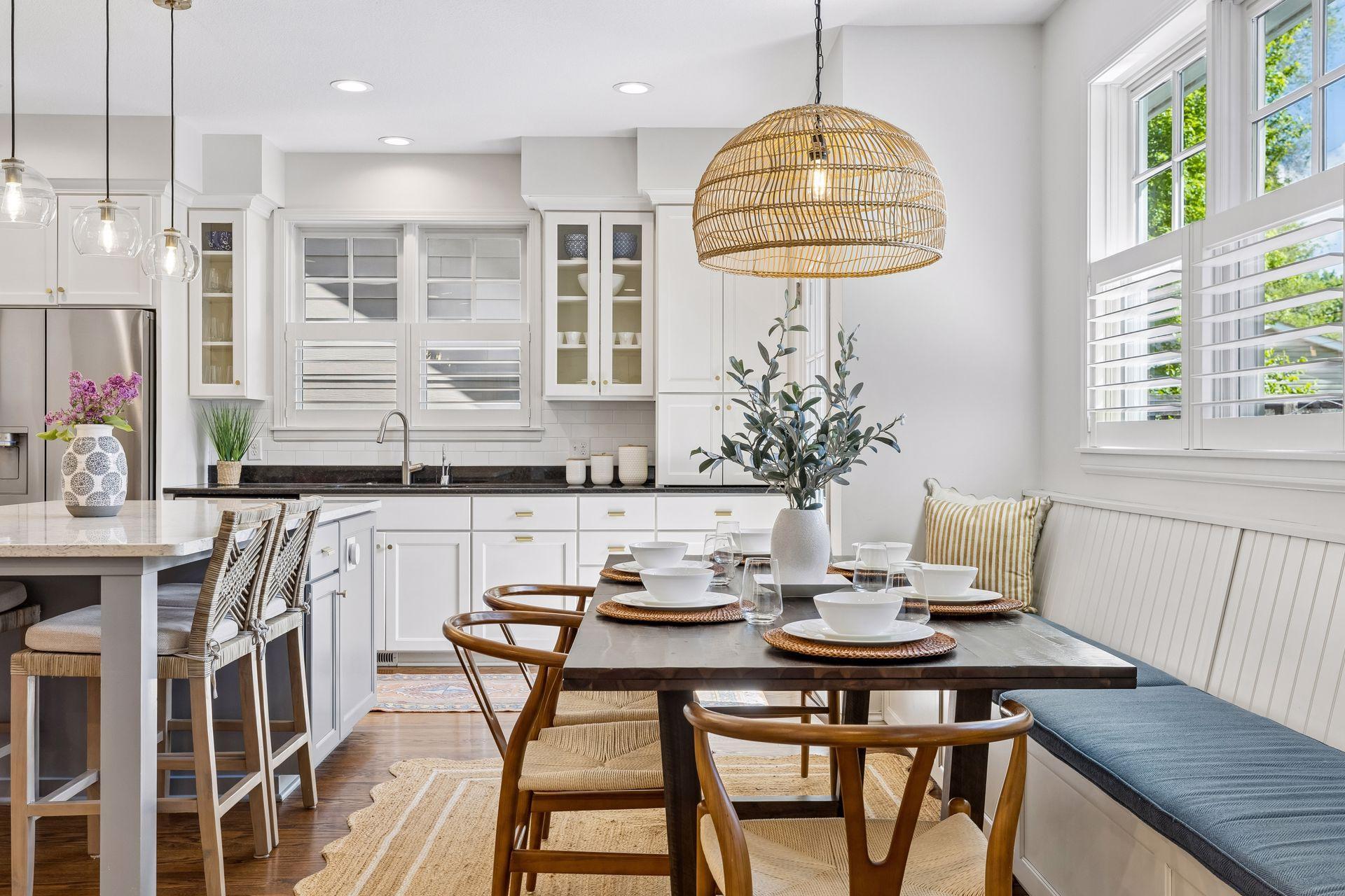 Stylish updated lighting in the kitchen and dining areas.