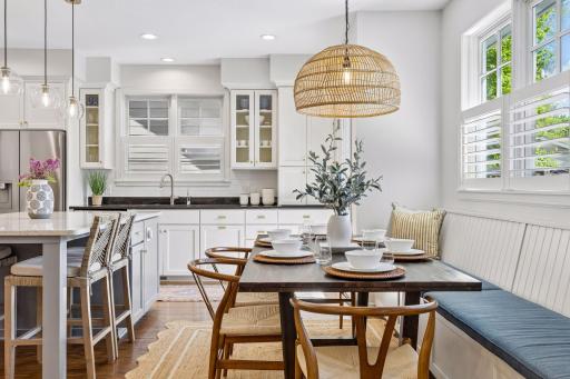 Stylish updated lighting in the kitchen and dining areas.