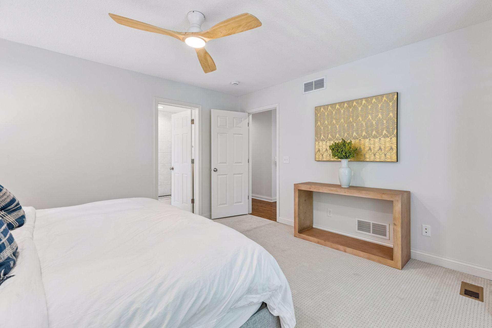 Brand new carpet and ceiling fan with LED light in primary suite.