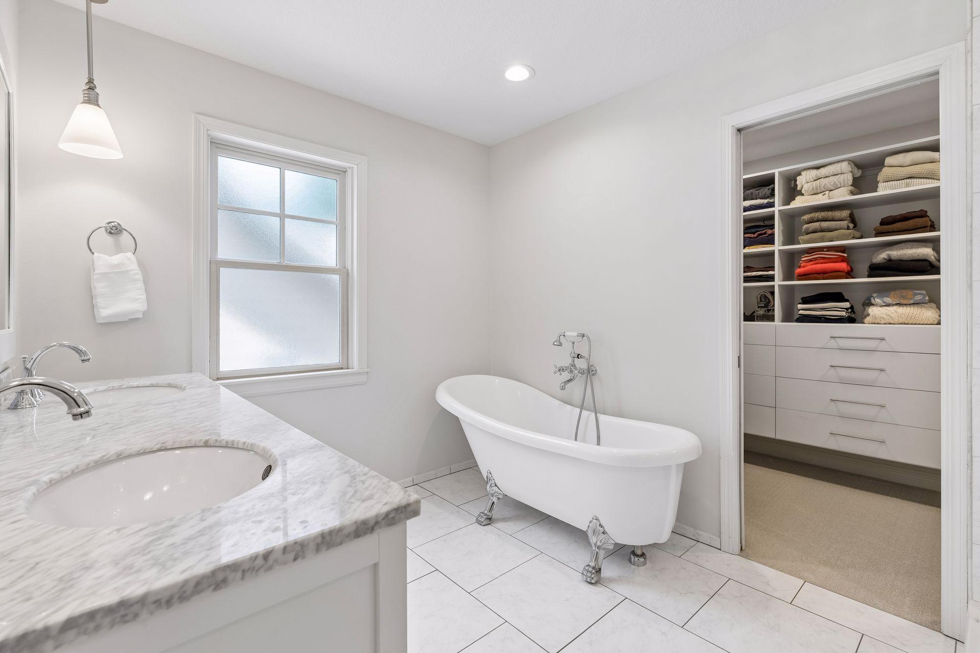 Frosted glass window allows for natural light with privacy.