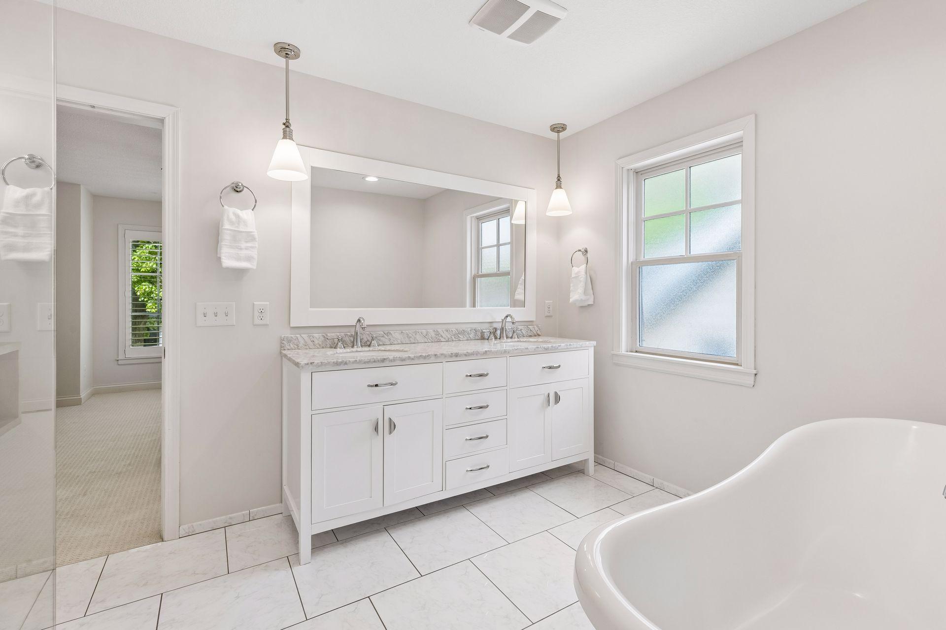 Luxurious heated flooring in the primary ensuite bath.