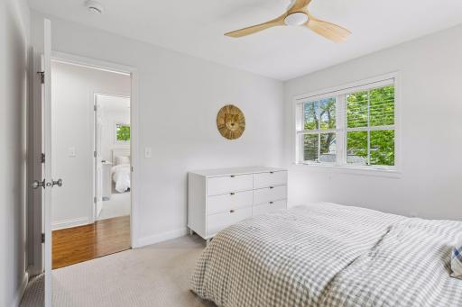 Divided bedroom floor plan, with bedrooms two and three at the end of the hall.