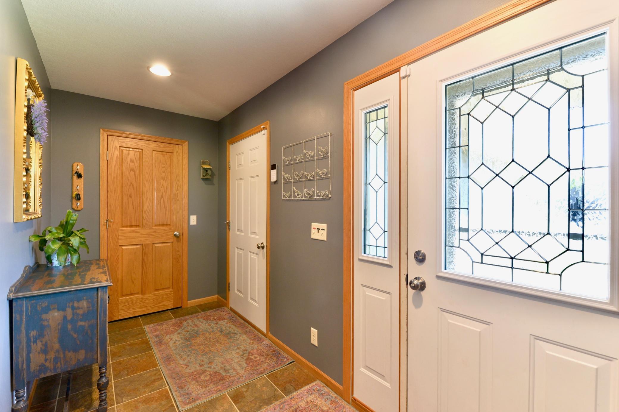 Ample sized entry from porch and garage plus a closet