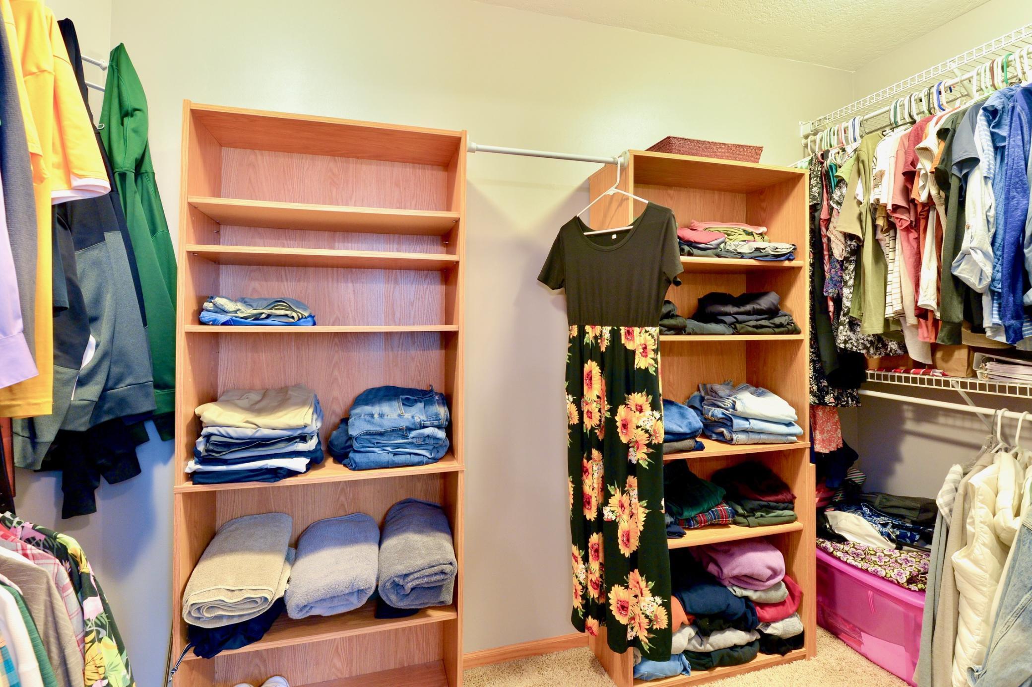 Primary walk in closet is in the bath for easy access to clothes