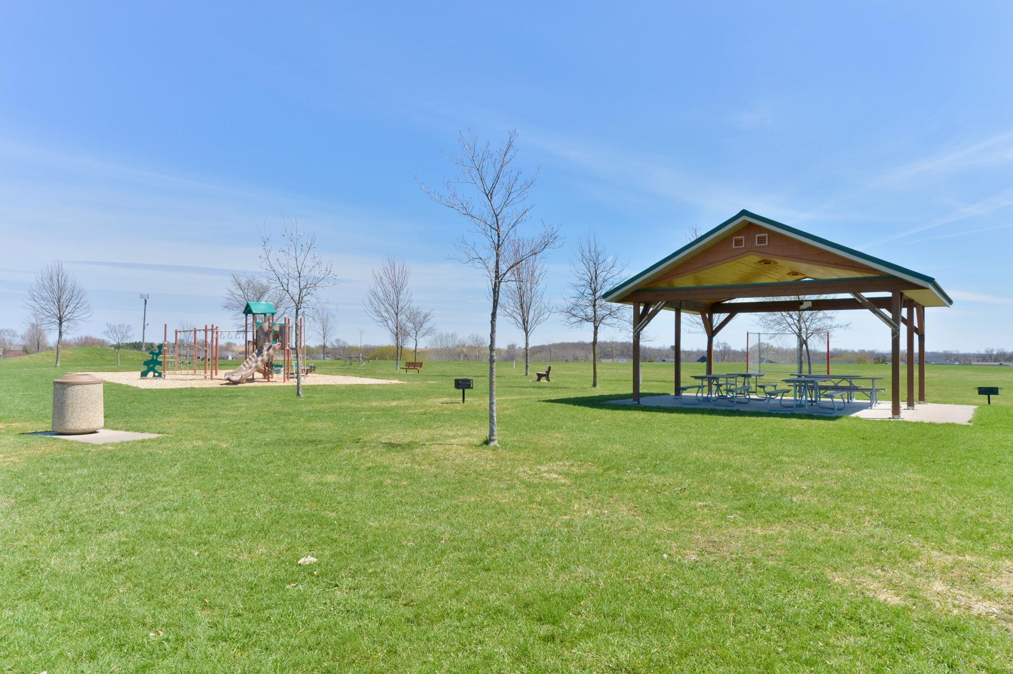 Nearby playground with Gazebo and basketball court
