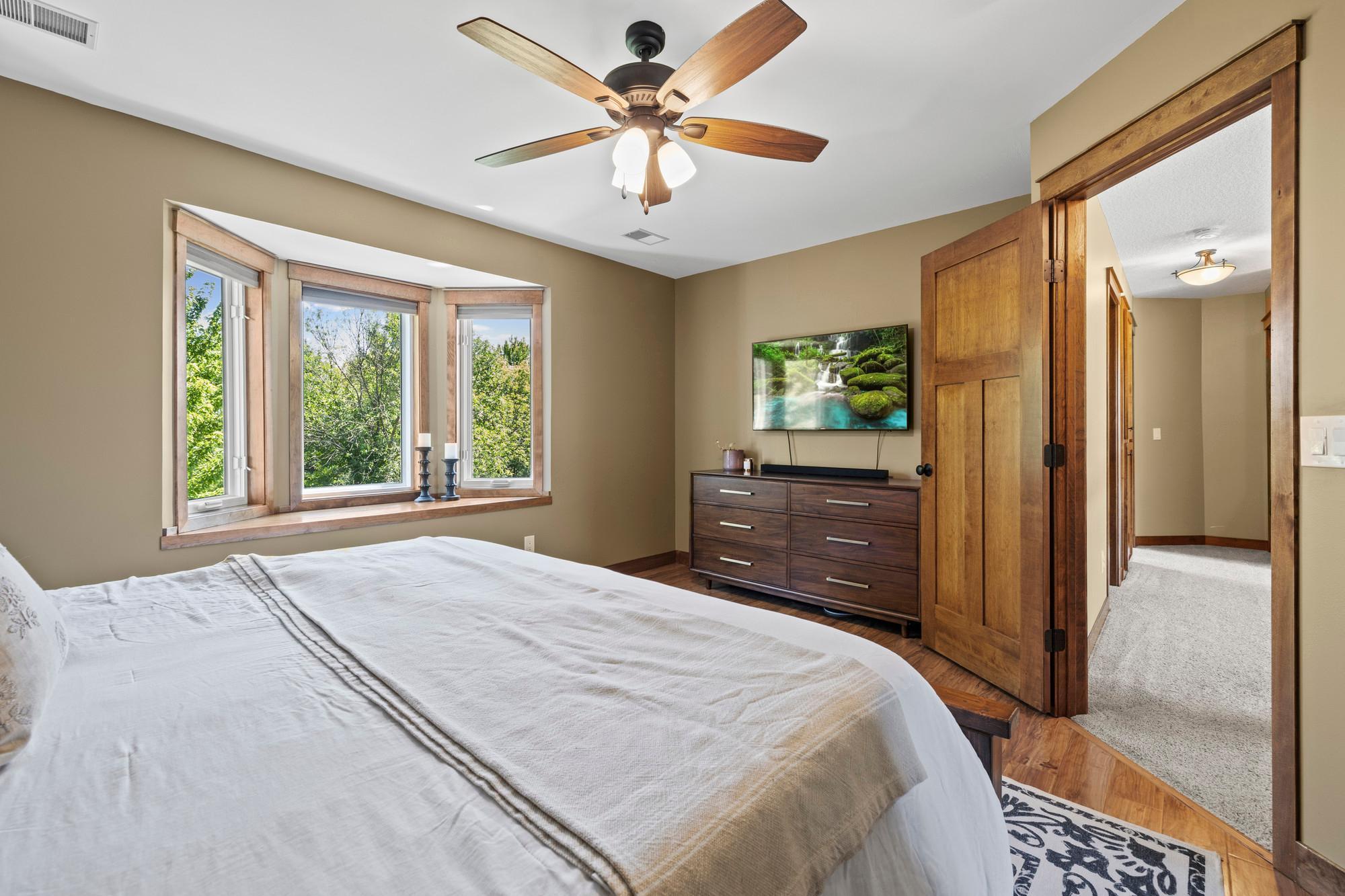 Primary bedroom has a backyard view