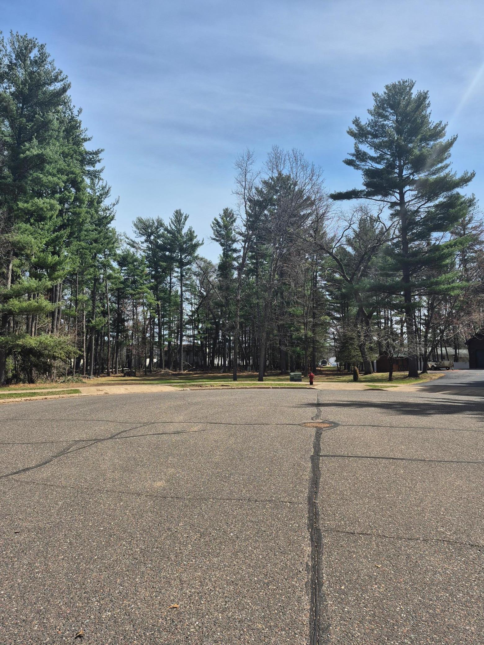 Asphalt streets with curb and sidewalk