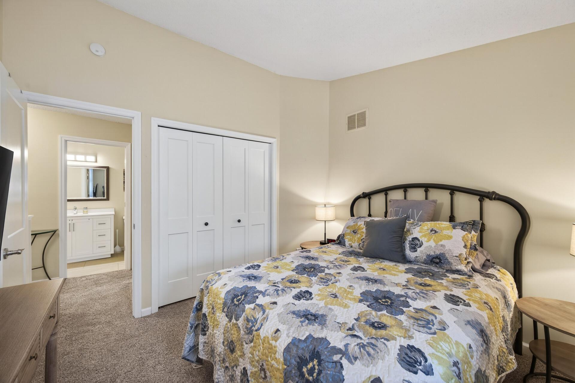 This bedroom has 2 closets