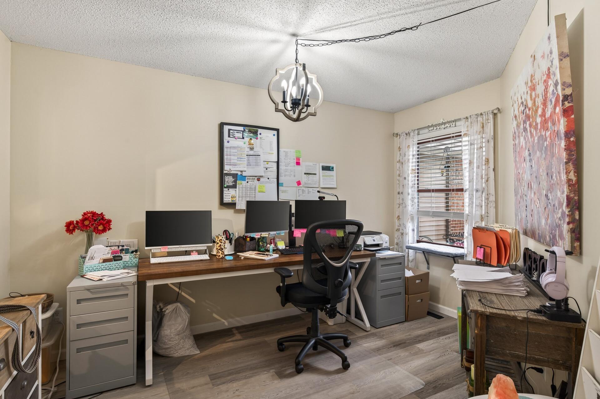 Formal dining room currently used as a home office.