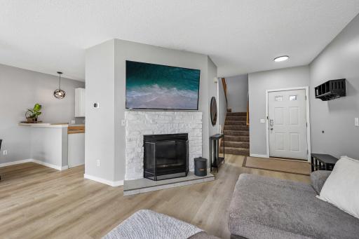 Gas Burning Fire Place Located in Living Room