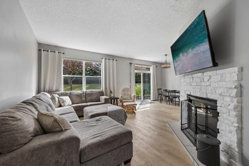 Living Room Opens to Dining Room and Walk Out Patio
