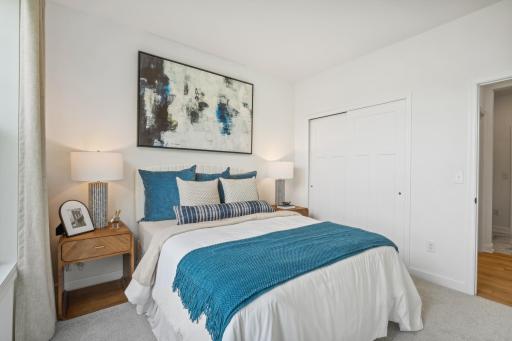(Photo of model home, finishes will vary) Located on the first floor, this bedroom can accommodate overnight guests or visiting family members. It is adjacent to a full-sized bathroom for easy convenience.