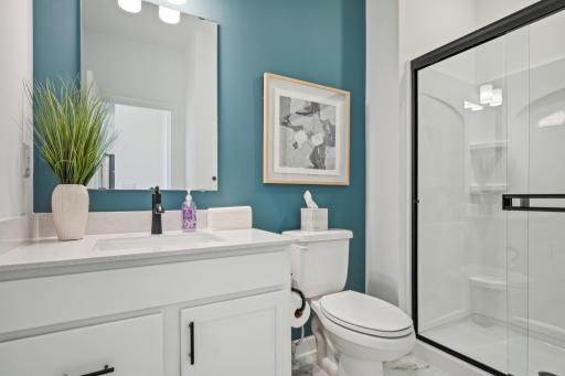 (Photo of model home, finishes will vary) Main level bath.