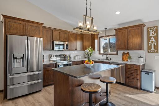 Large center island with stone countertop