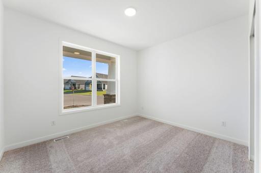 At the front of the home is a bedroom to accommodate family members or visiting guests.