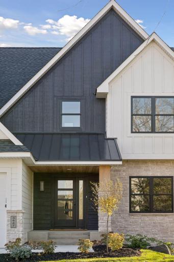 LP Siding, Black Andersen windows and a cedar soffit front porch all add the beautiful curb appeal