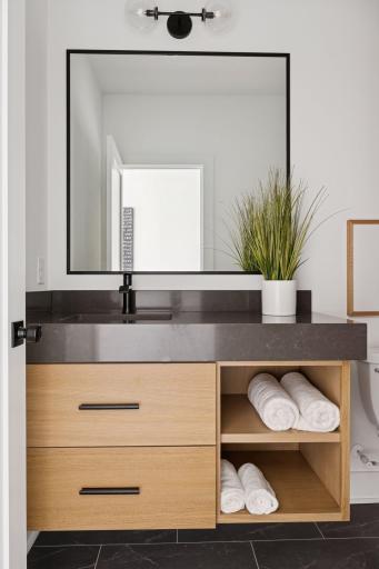 Private lower level 3/4 bath with tile shower and tub