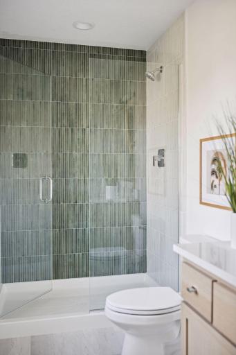 Private tiled shower in the ensuite bedroom bath