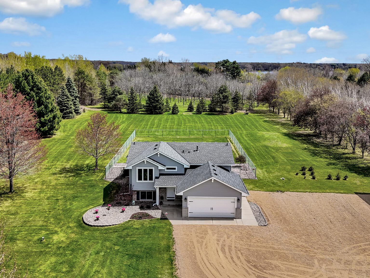 Park like setting on 5.46 beautiful acres - only 30 minute to the Twin Cities